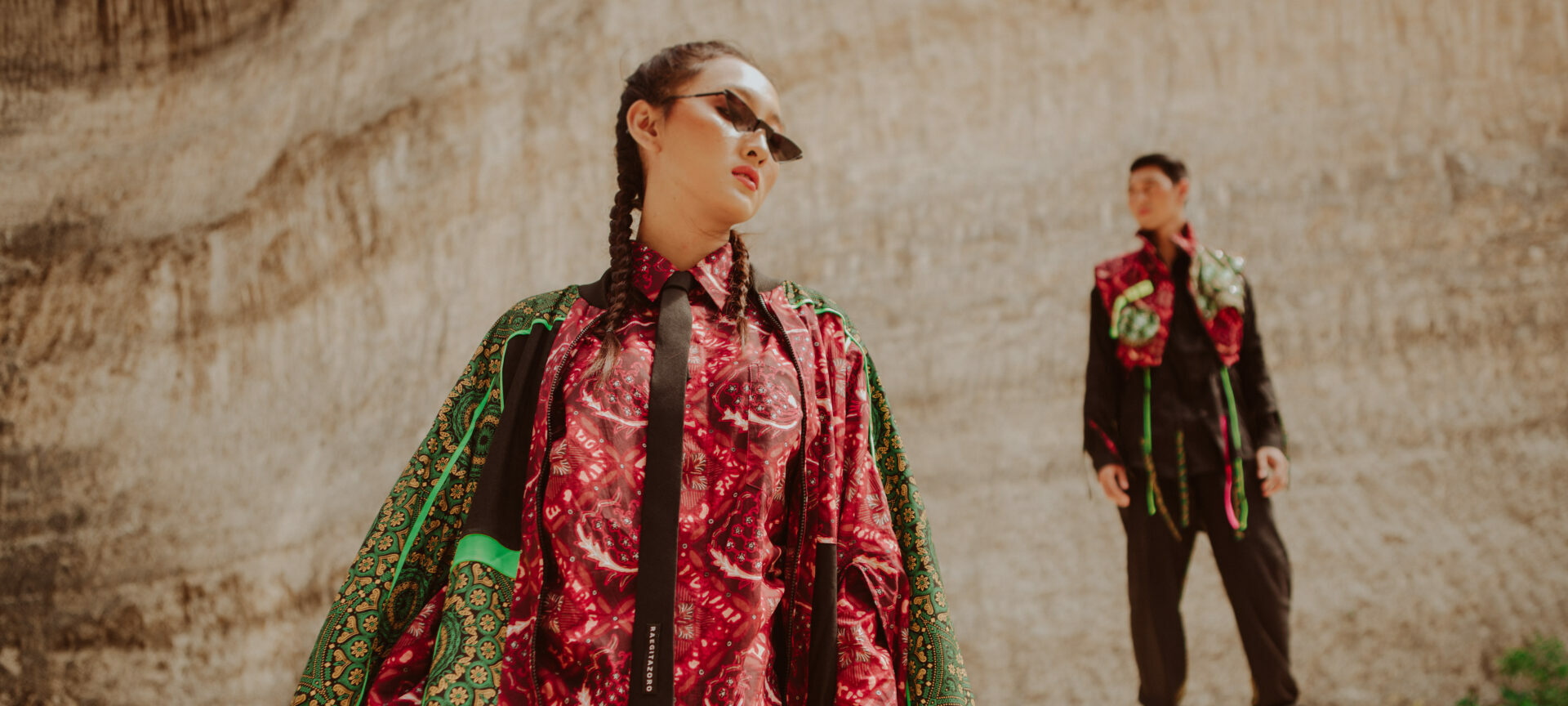 Two people wearing Indonesian garments