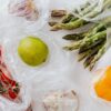 Assortment of fresh vegetables and fruits put in plastic bags