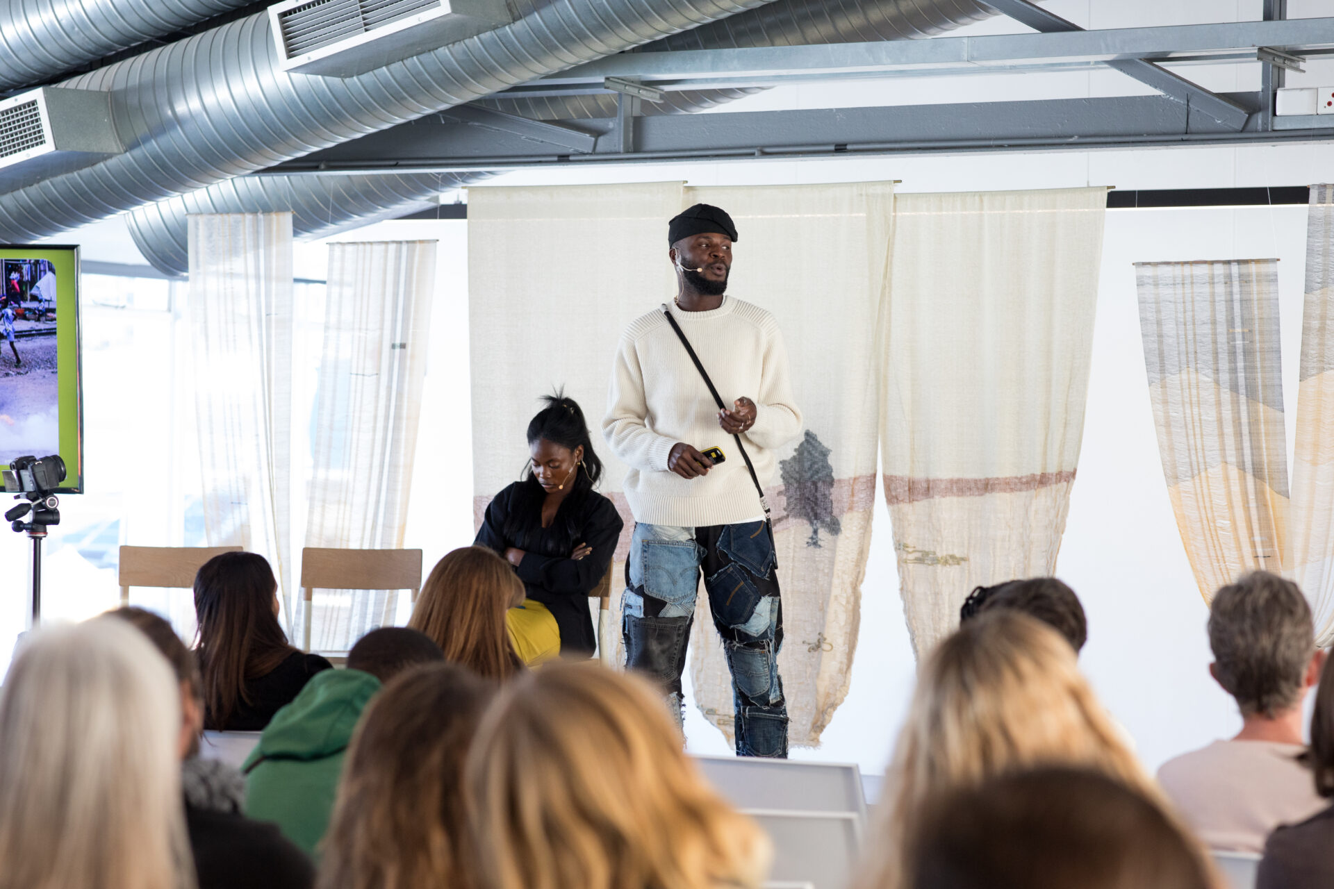 Sammy Oteng from The Or Foundation on stage. Photo by The Dollie House